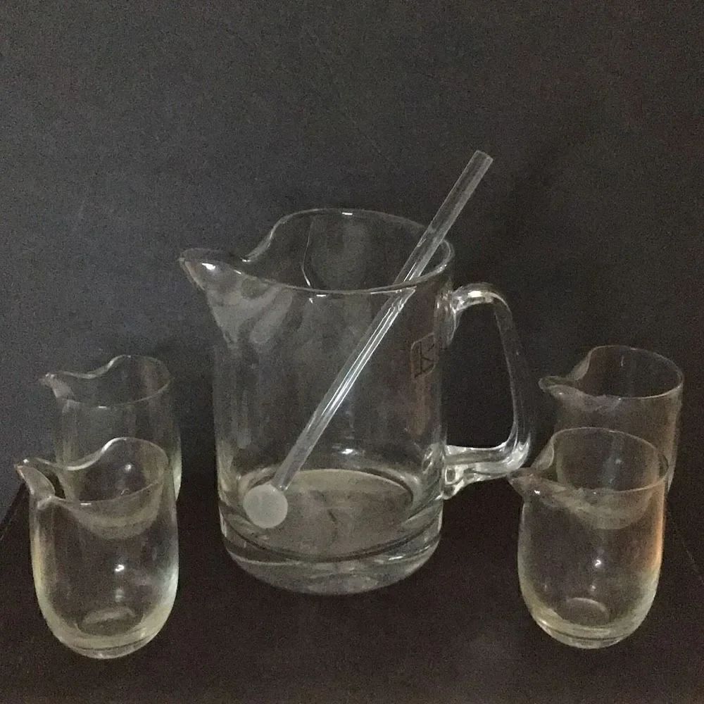 Pitcher and stirrer By Knobler with four matching glasses ￼